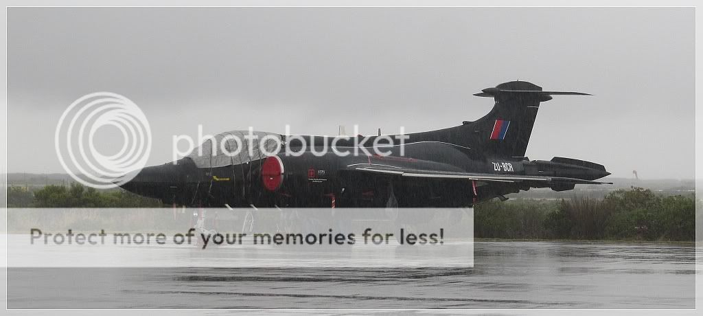 http://i806.photobucket.com/albums/yy350/dualriders/Buccaneerinrain-1.jpg